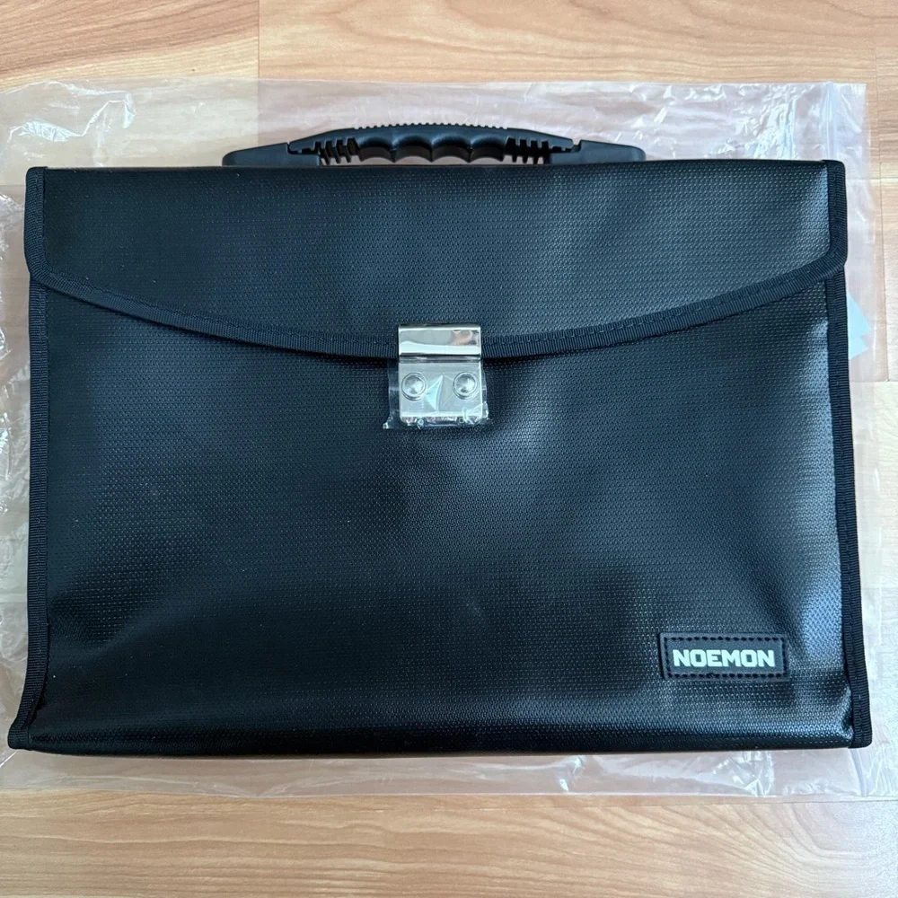 Noemon Black Briefcase Bag – New, 25 Pockets, Never Used